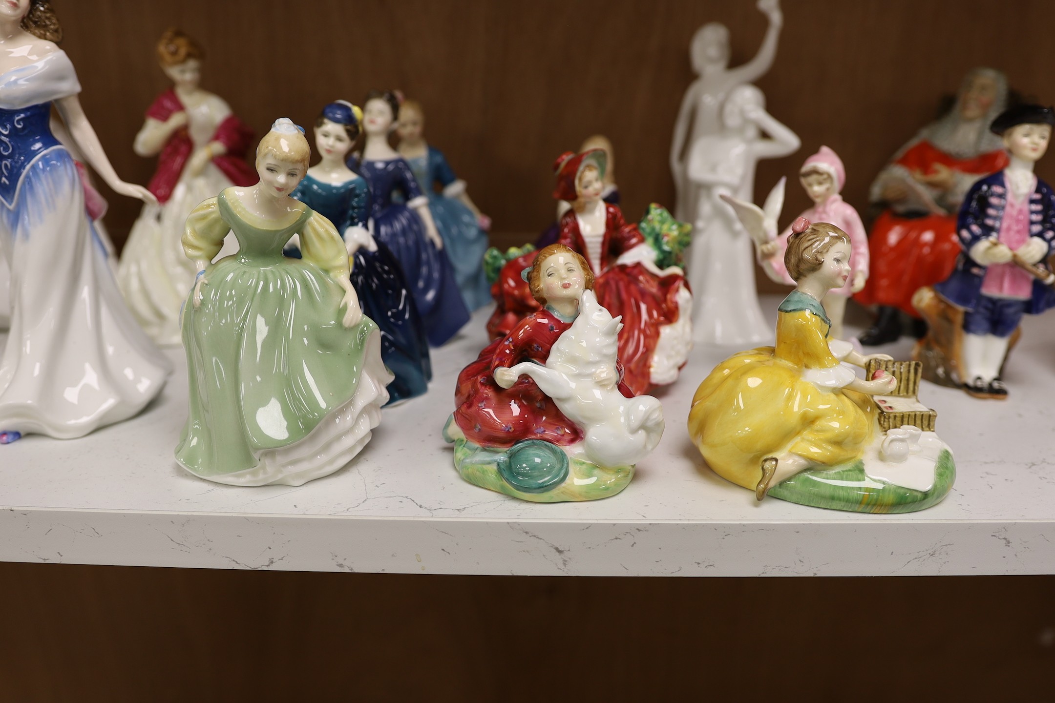 A collection of mostly Royal Doulton and Worcester figurines (22)